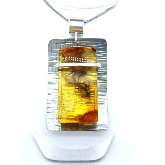 Titan Anhänger mit echtem Bernstein Unikat