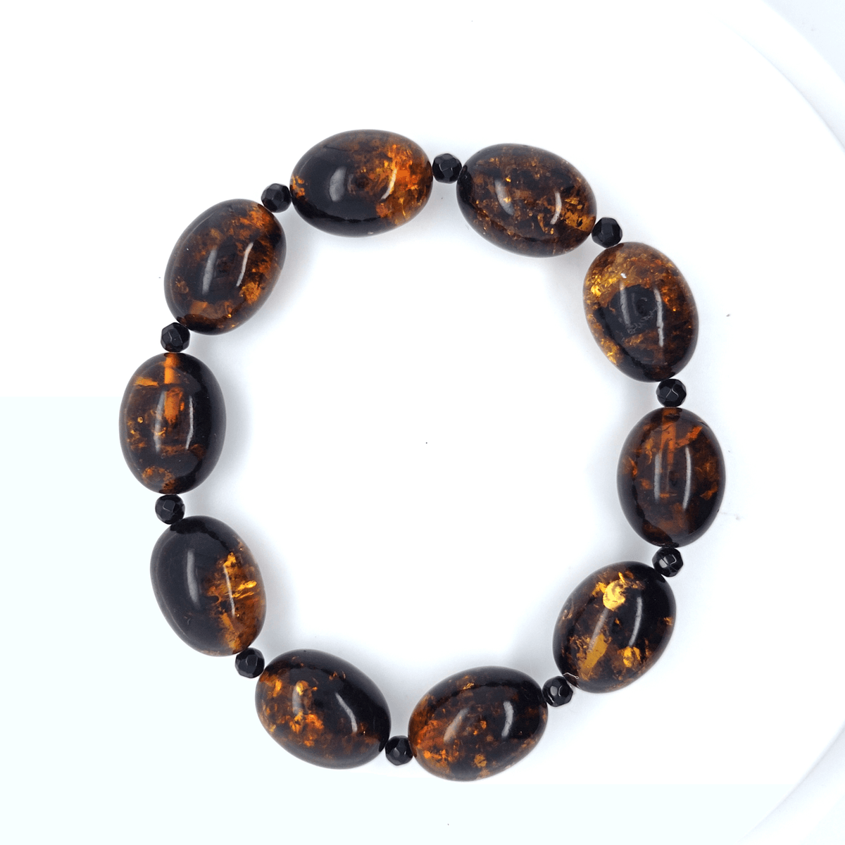 Braunes Bernsteinarmband mit Sonnenflitter in Orange & Gold – elastisch, Ostsee-Bernstein