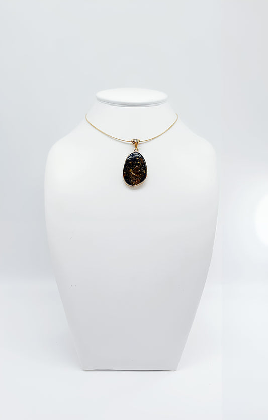 Starry Night: Gold-plated amber pendant