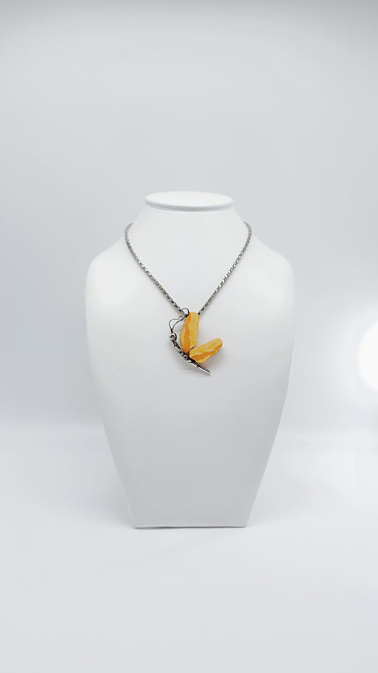 Natural magic: butterfly made of amber and silver