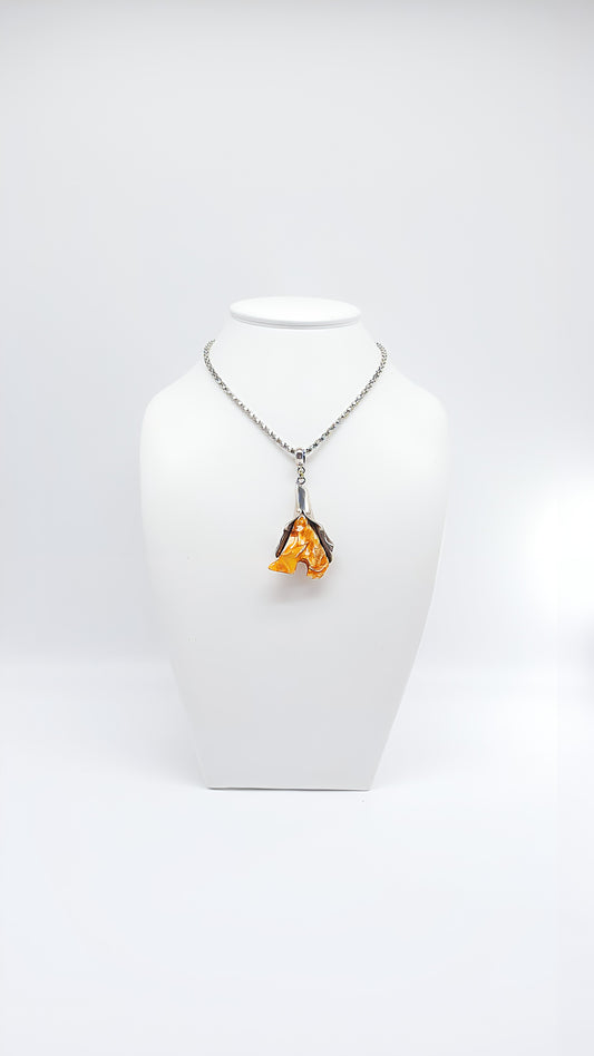 Whispering nature: unique amber pendant
