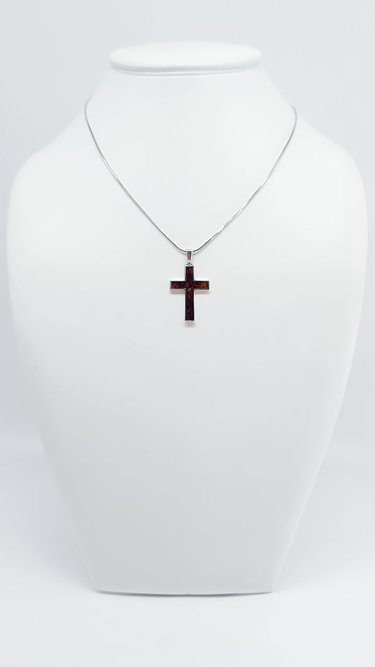 Elegant cross design with bright amber