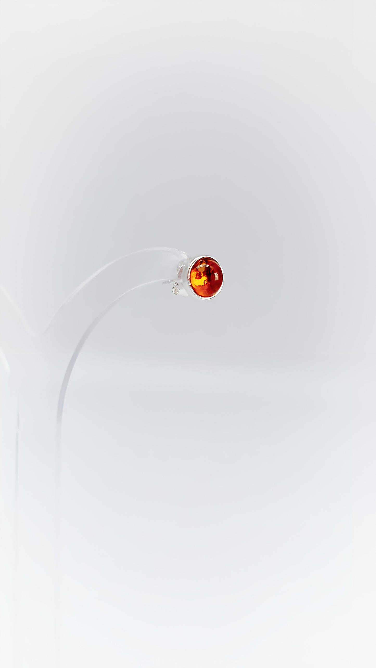 Round perfection: amber earrings in silver