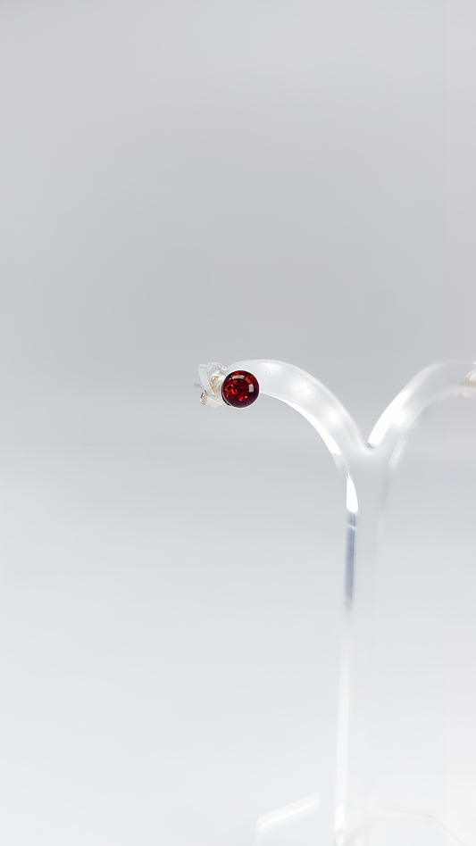 Delicate elegance: round amber stud earrings