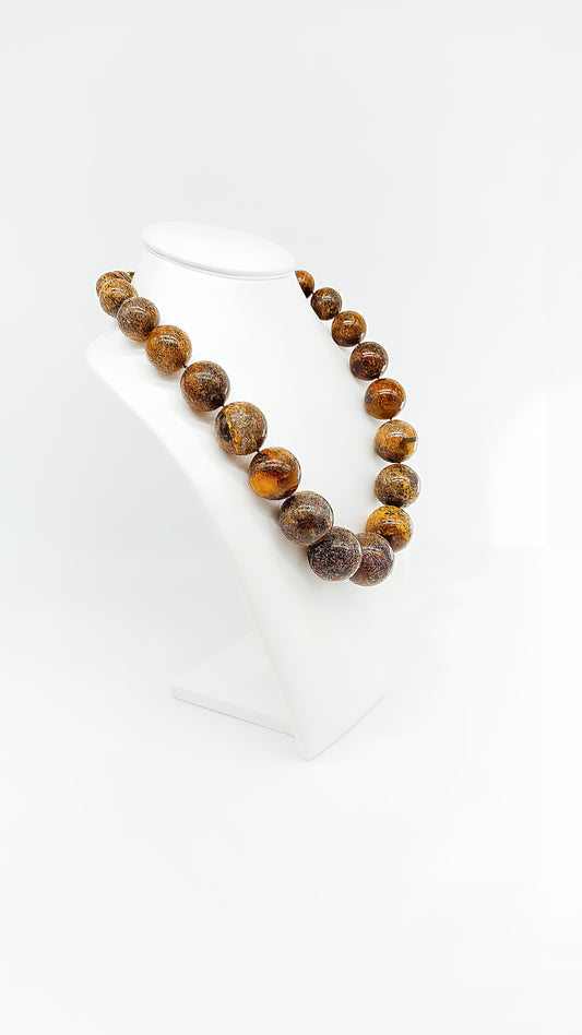 Mysterious depth: unique piece made of dark amber