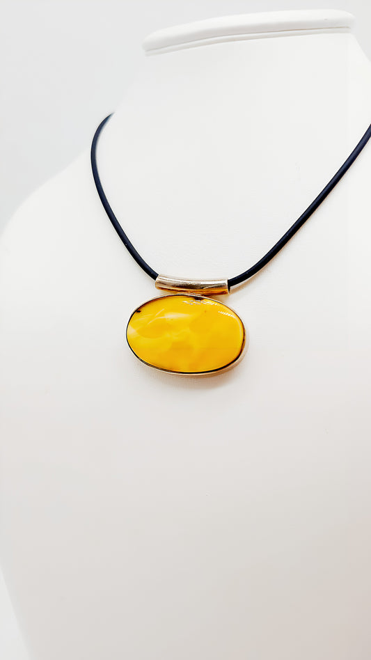 Bright yellow: amber in a silver frame
