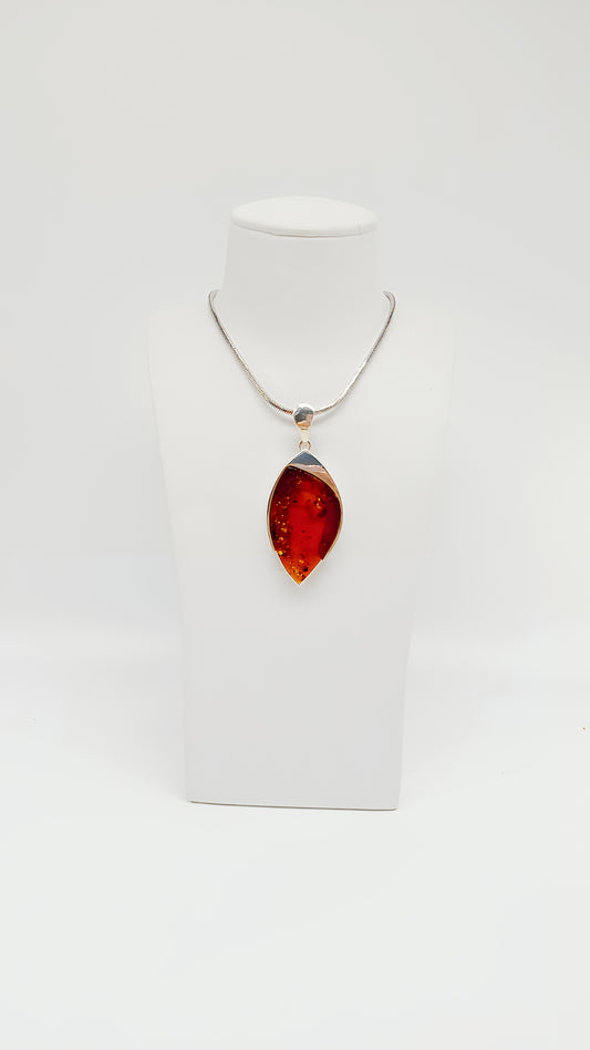 Amber in red: A unique piece to fall in love with