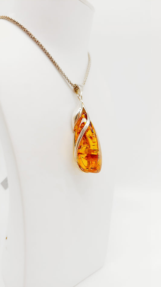 Drop pendant made of amber 925 silver elegant design