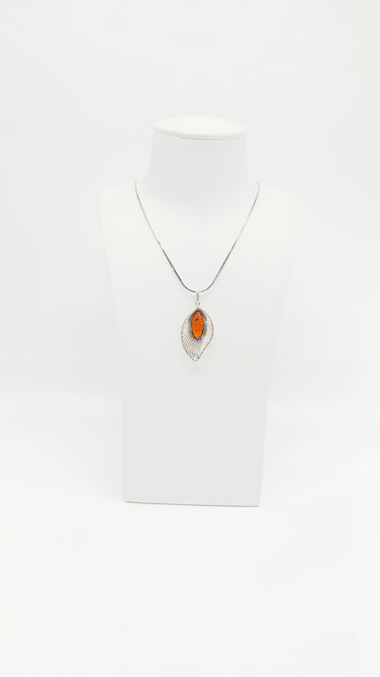 Elegance and refinement: amber with gold decorations