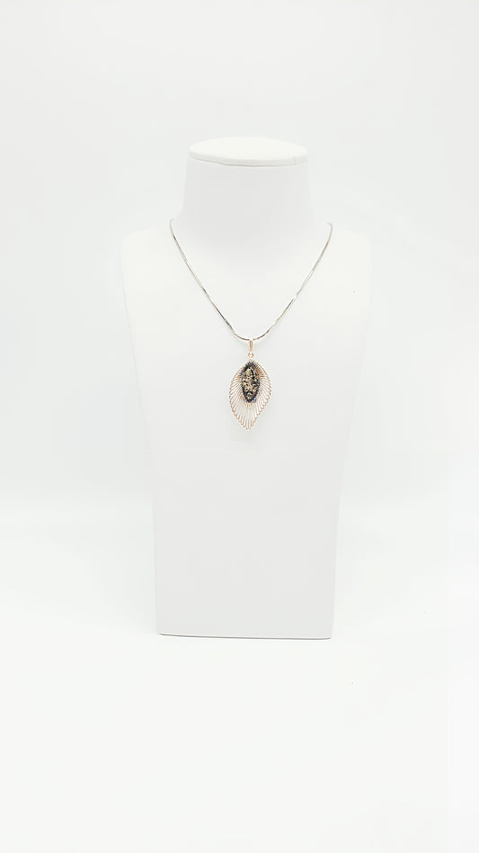 Green amber in a filigree design