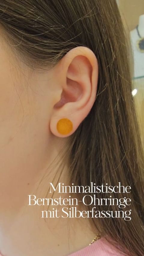 Minimalist amber earrings with silver setting