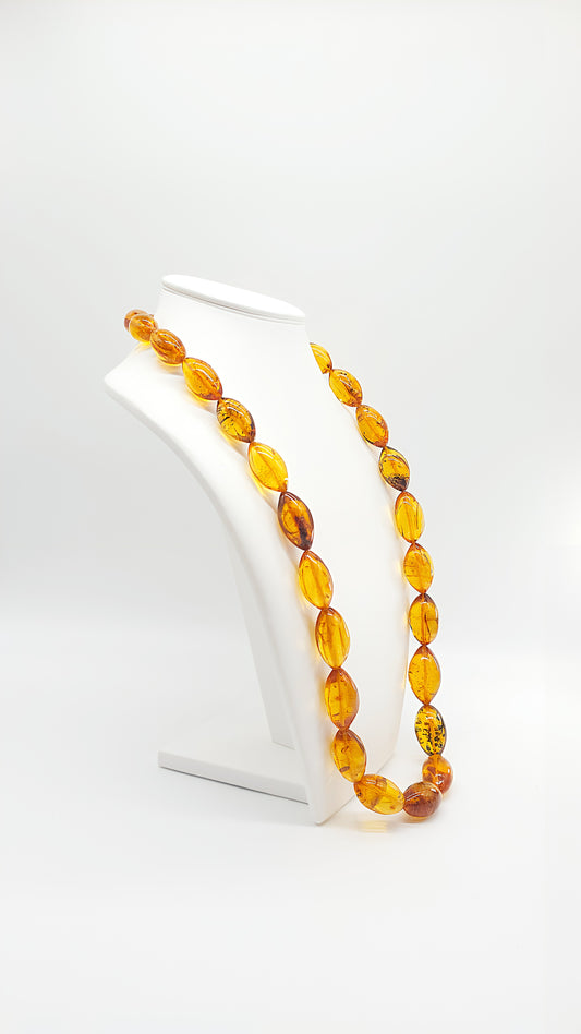 Golden Amber: A luxurious unique piece, each piece of amber contains an insect