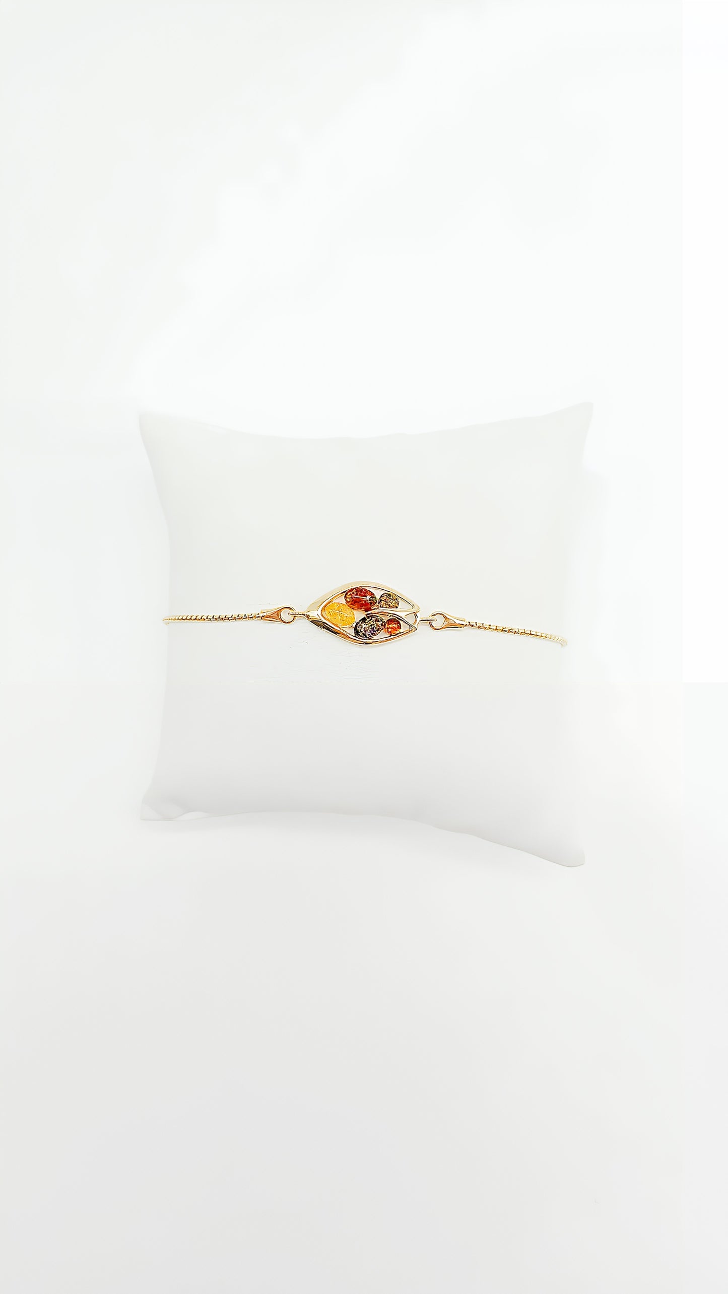 Colorful treasures: amber and gold-plated silver