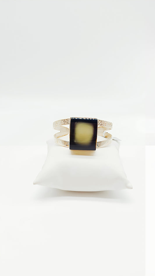 Mystical elegance: green amber in silver design