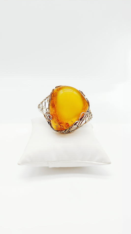 Great elegance: amber bangle with a unique shape