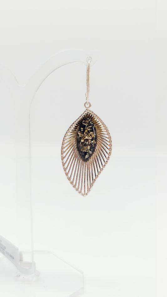 Harmonious design: Silver earrings with amber
