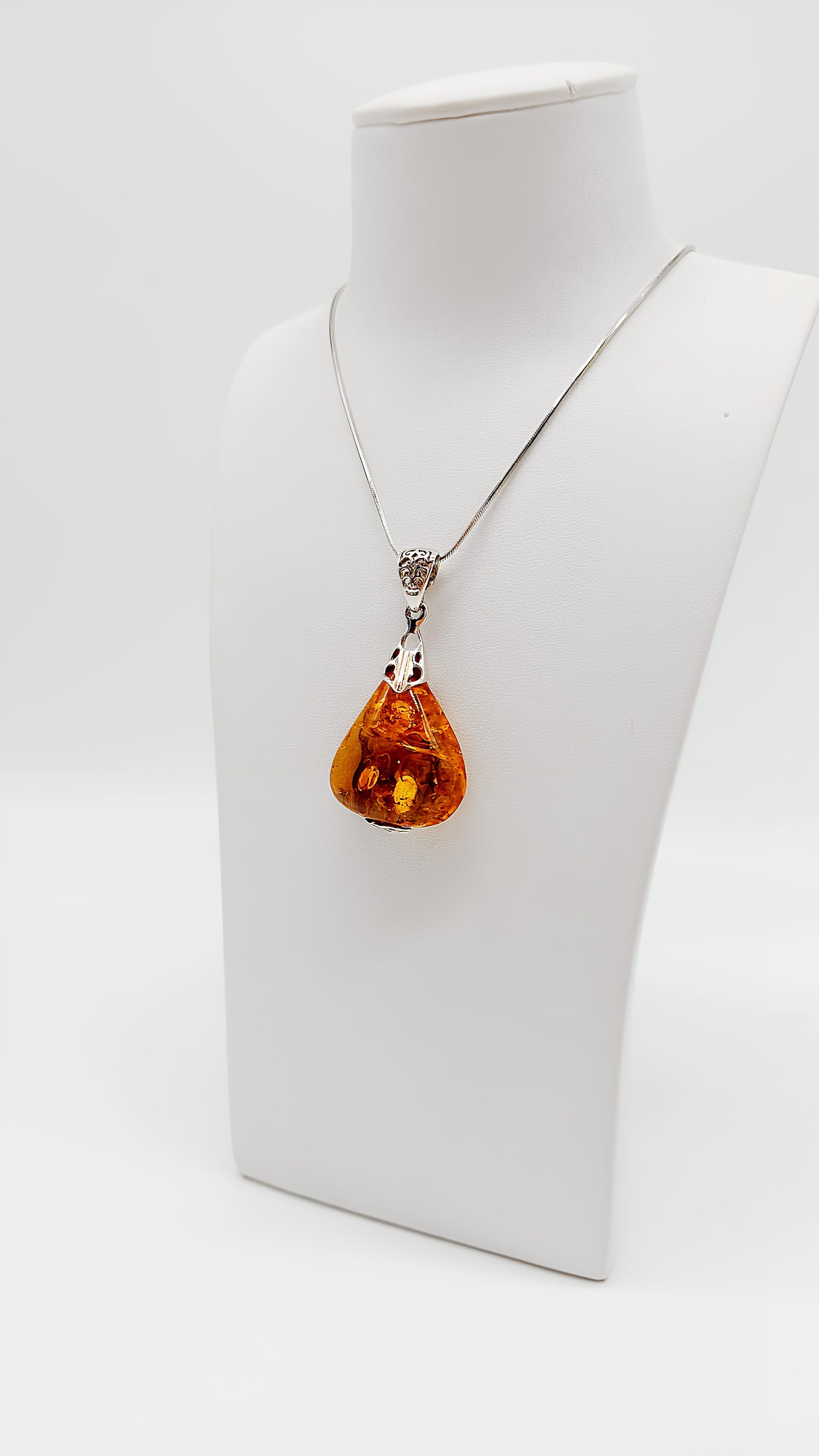 Brilliant amber pendant in drop design
