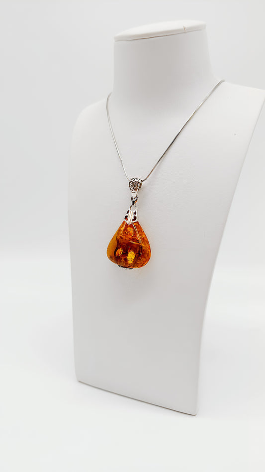 Brilliant amber pendant in drop design