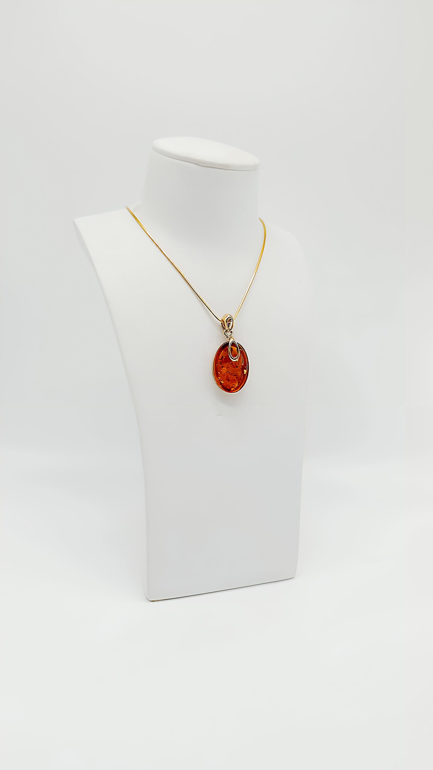Designer Bernstein Anhänger mit vergoldeter Fassung