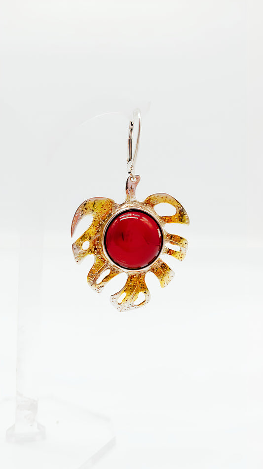Gold-plated leaf design with bright amber