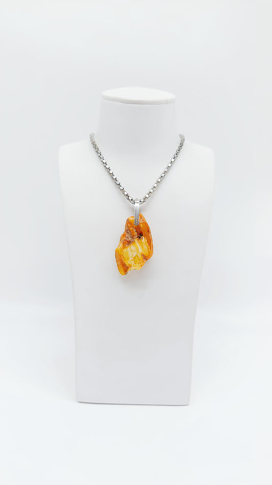 Natural amber meets precious silver