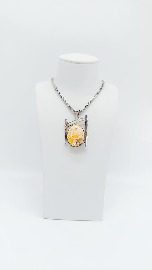 Modern design: amber in a silver frame