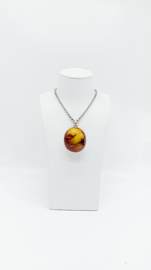 Round amber: pure nature set in silver