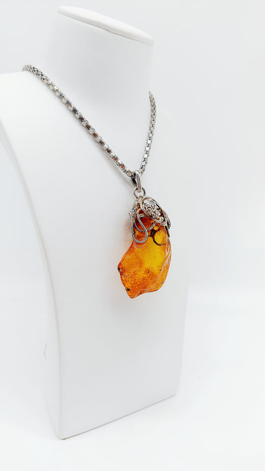 Pure nature: raw amber set in 925 silver