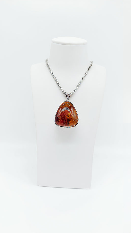 Amber pendant in drop shape – handmade unique piece