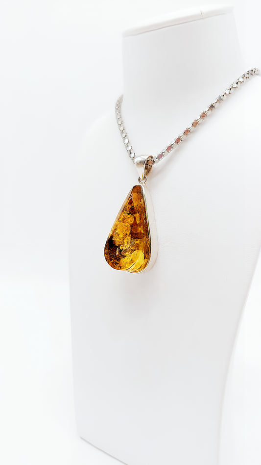 Warm drop-shaped amber pendant made of 925 silver