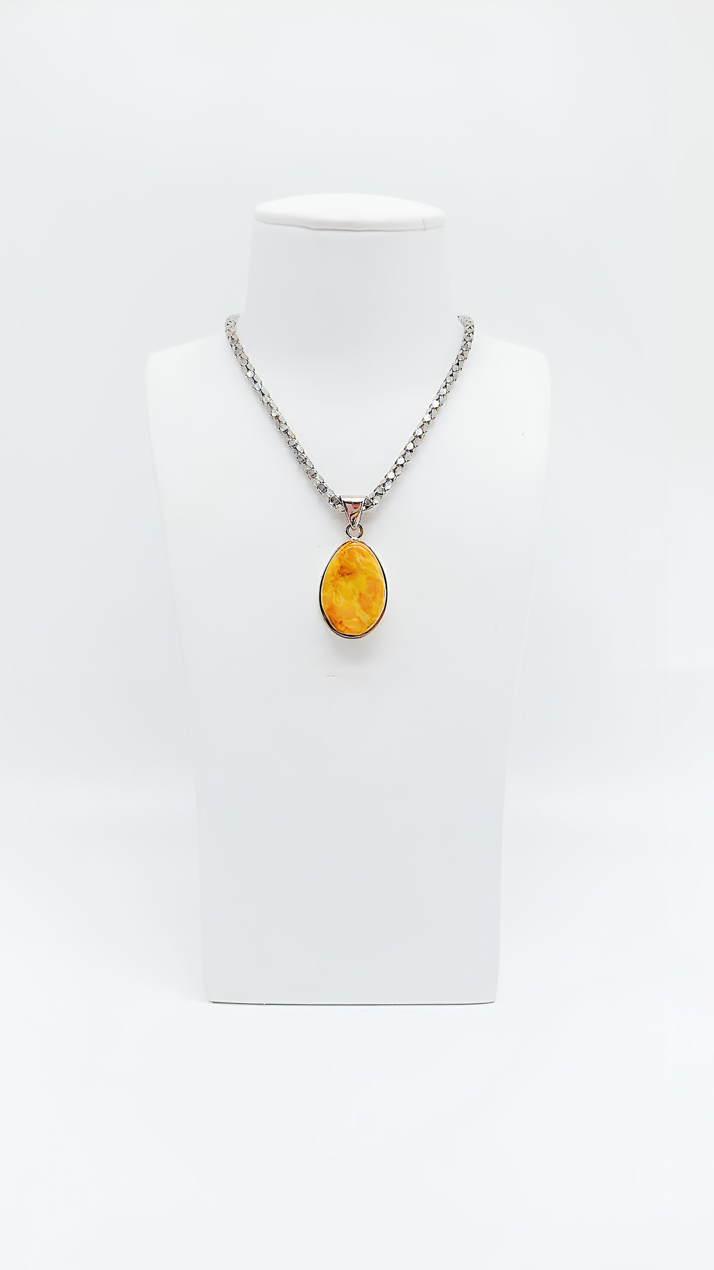 Exclusive unique jewelry – amber pendant in silver