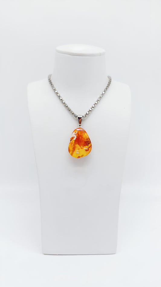 Glow and shine: handmade amber pendant