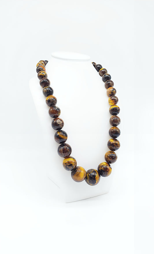 Mystical necklace made of genuine dark amber