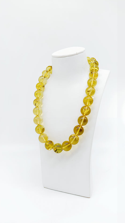 Sun-yellow unique necklace made of genuine amber for women