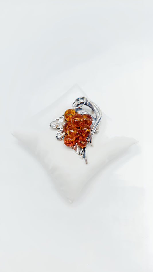 Amber dream: Unique silver brooch
