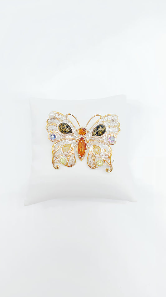 Butterfly dream: noble silver brooch with amber