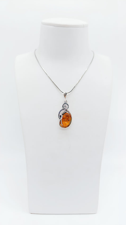 Artful amber elegance in silver