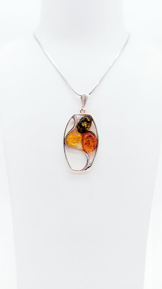 Multicolor amber pendant – a unique piece made of silver