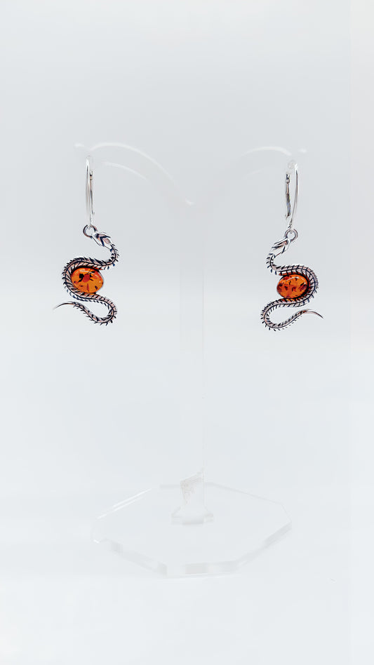 Snake amber earrings Elegance with mystical symbolism
