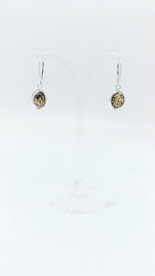 High-quality silver earrings with rare green amber