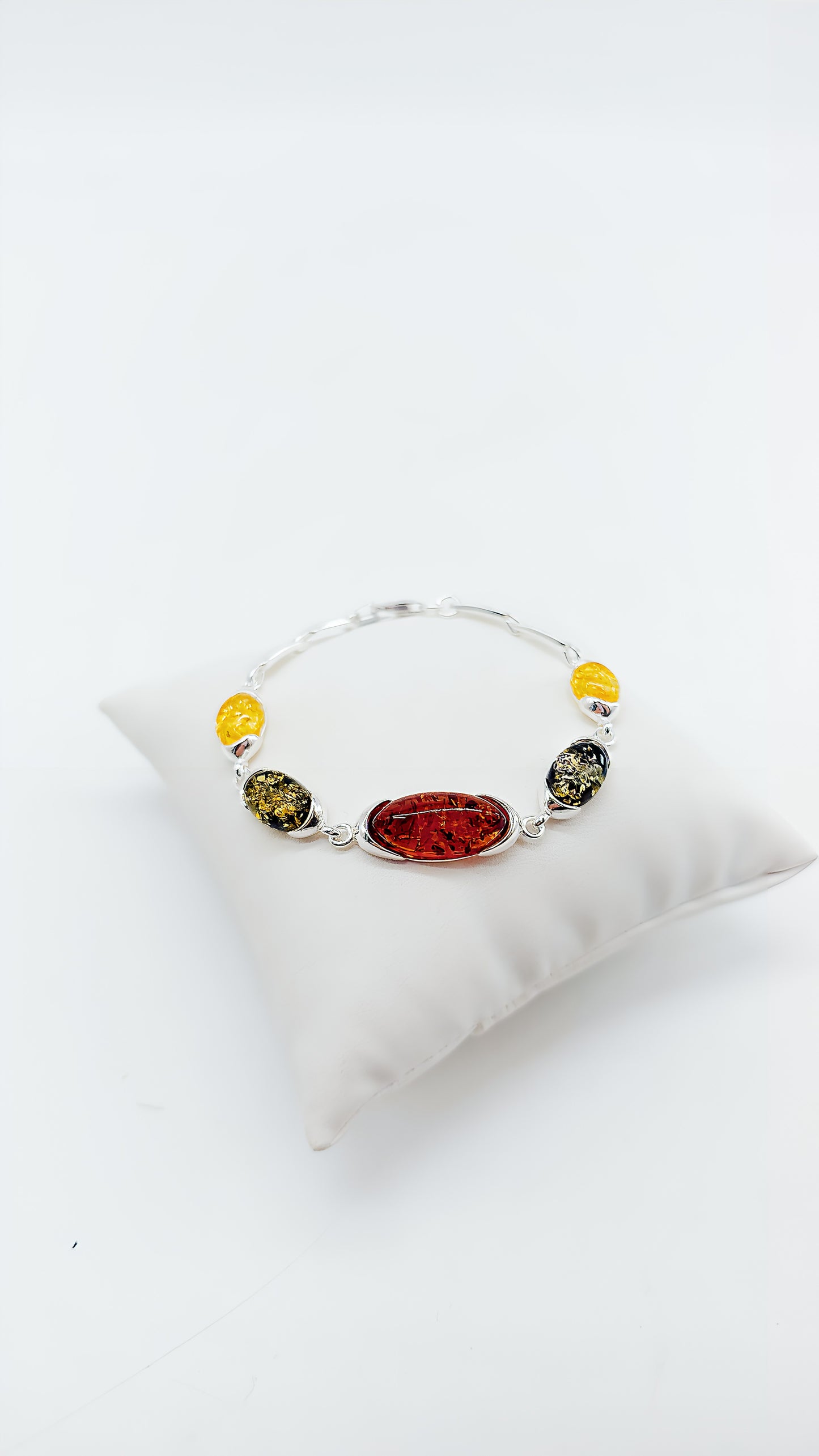 Play of colors in nature: Colorful amber bracelet in silver
