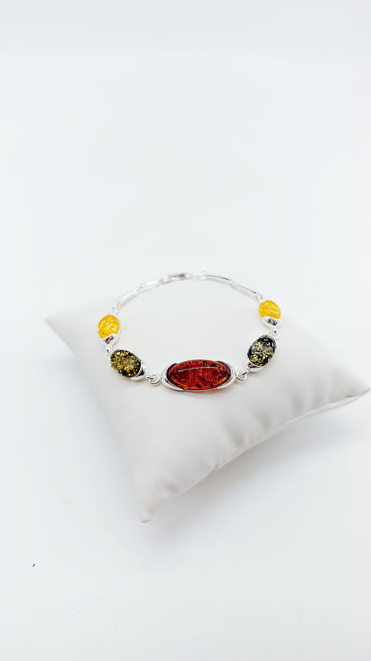Play of colors in nature: Colorful amber bracelet in silver