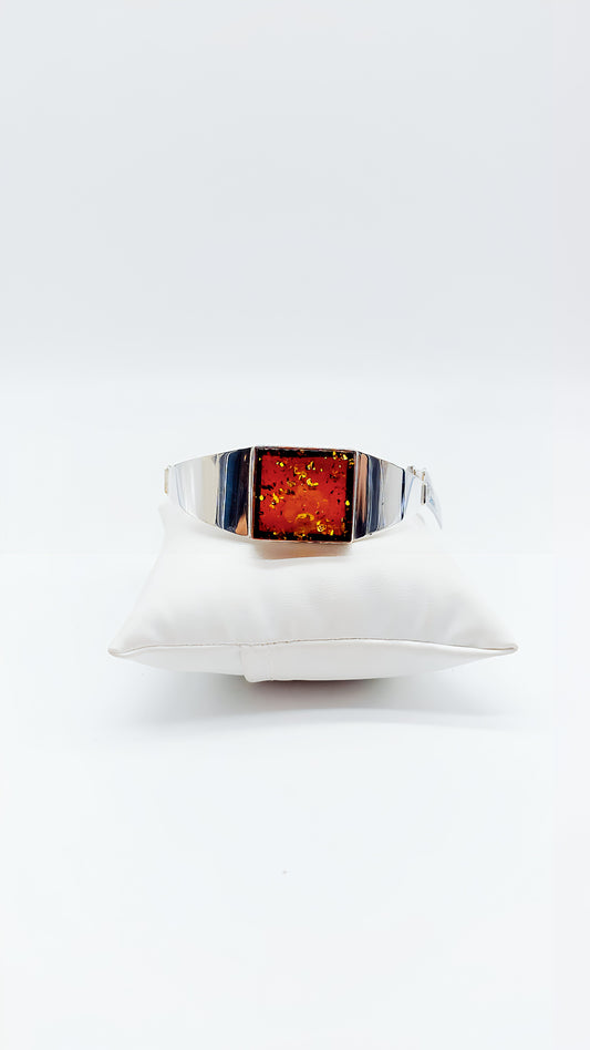 Radiant beauty: silver bangle with amber