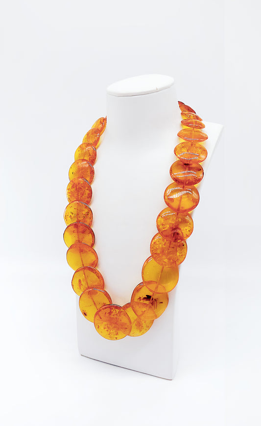 Luminous amber necklace made of genuine Baltic amber