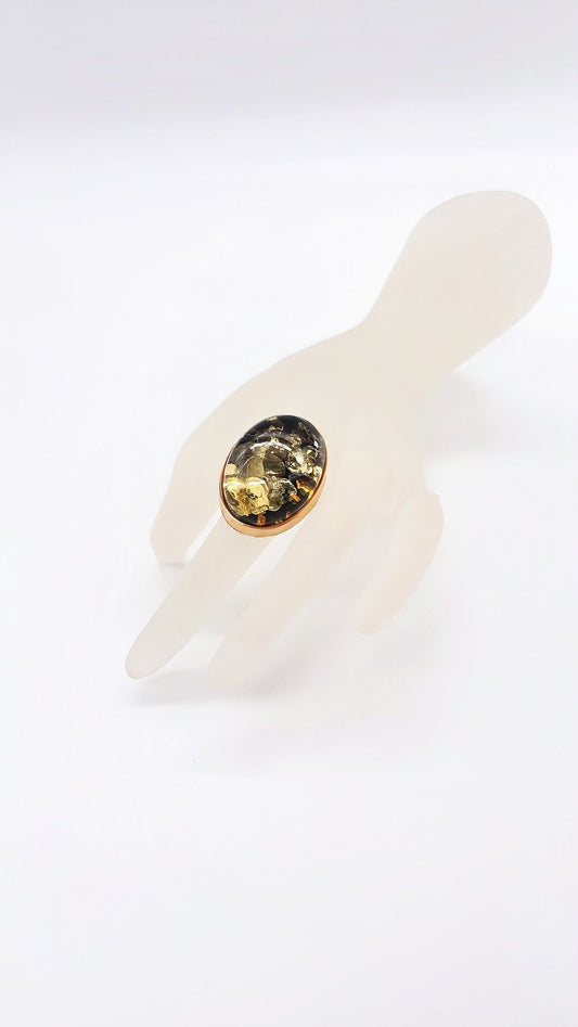 Adjustable silver ring with oval amber