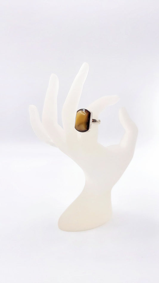 Discreet luxury: amber ring in silver