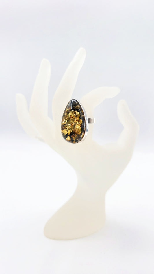 Unique jewelry: drop-shaped amber ring made of 925 silver