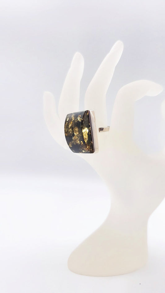 Adjustable silver ring with green amber – Handmade design