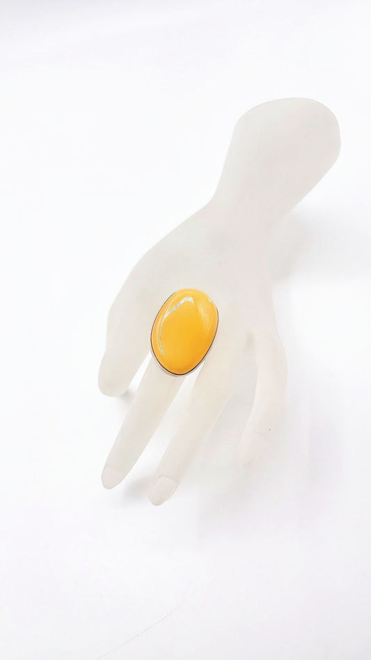 Oval yellow amber ring made of silver – unique and modern