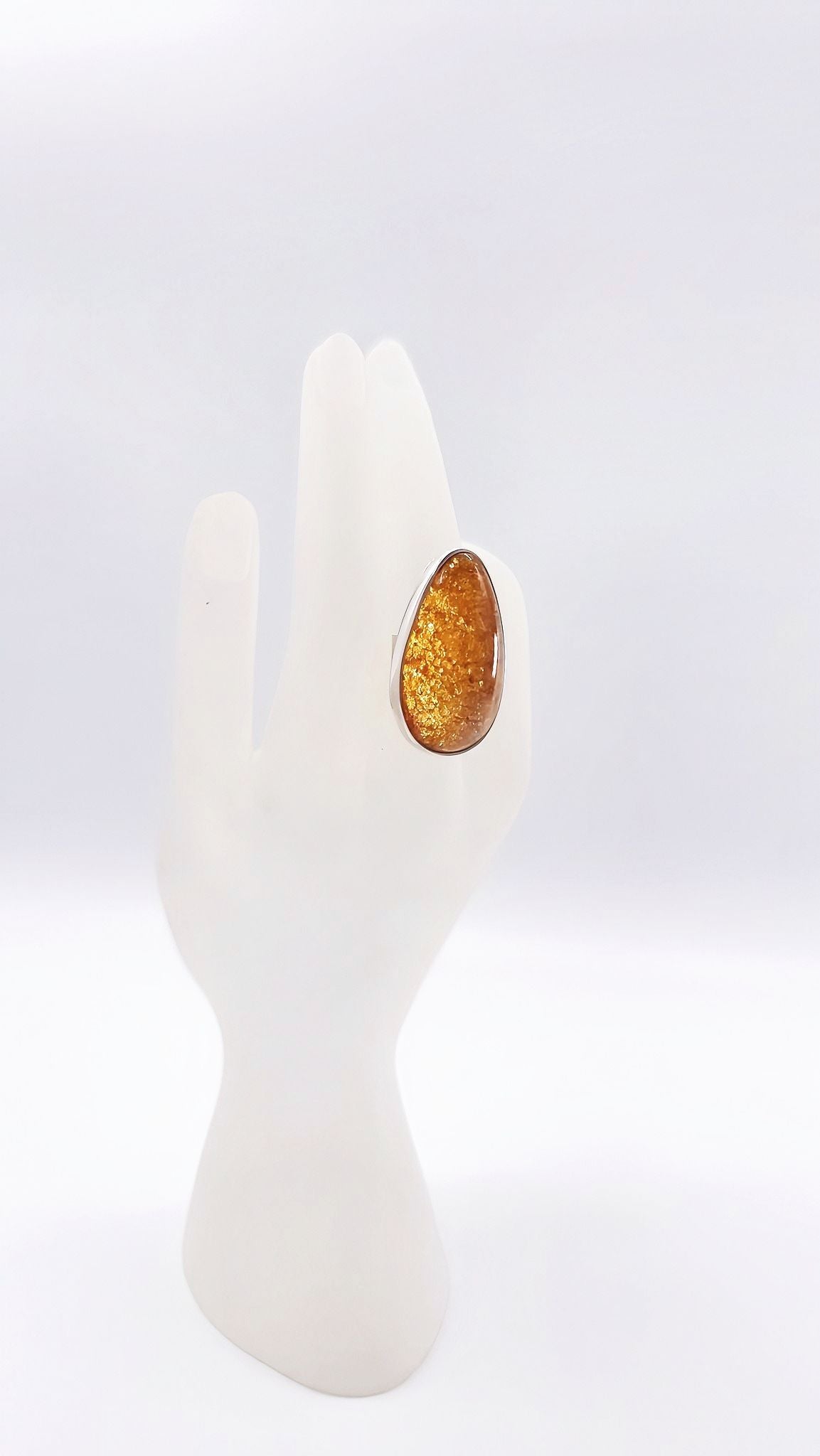 Unique jewelry: Amber ring made of 925 silver in a timeless design
